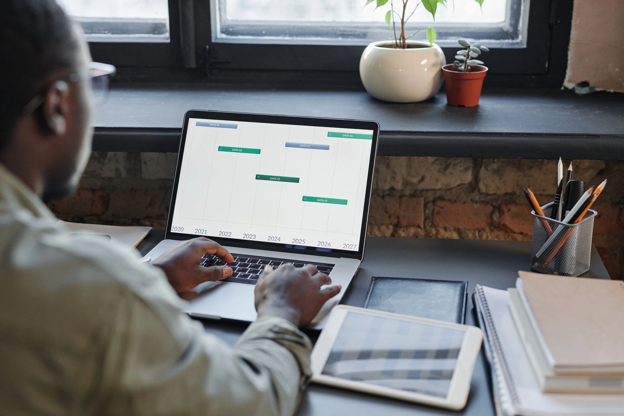 Restaurant operator reviewing analytics on a laptop