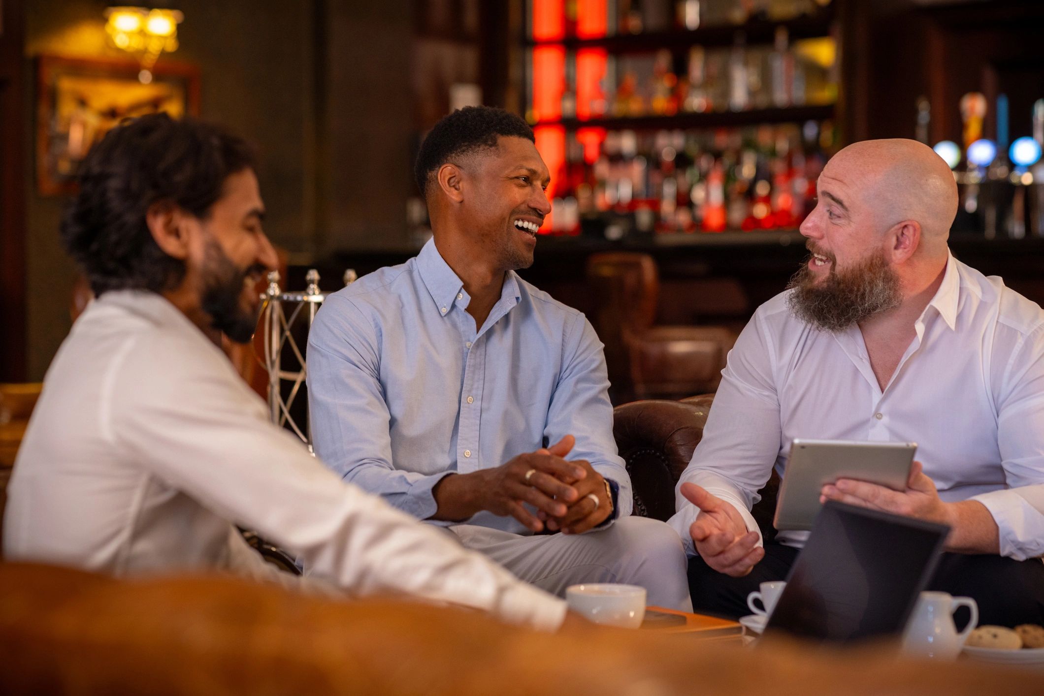 OmniTech-style consulting team meeting with restaurant operators