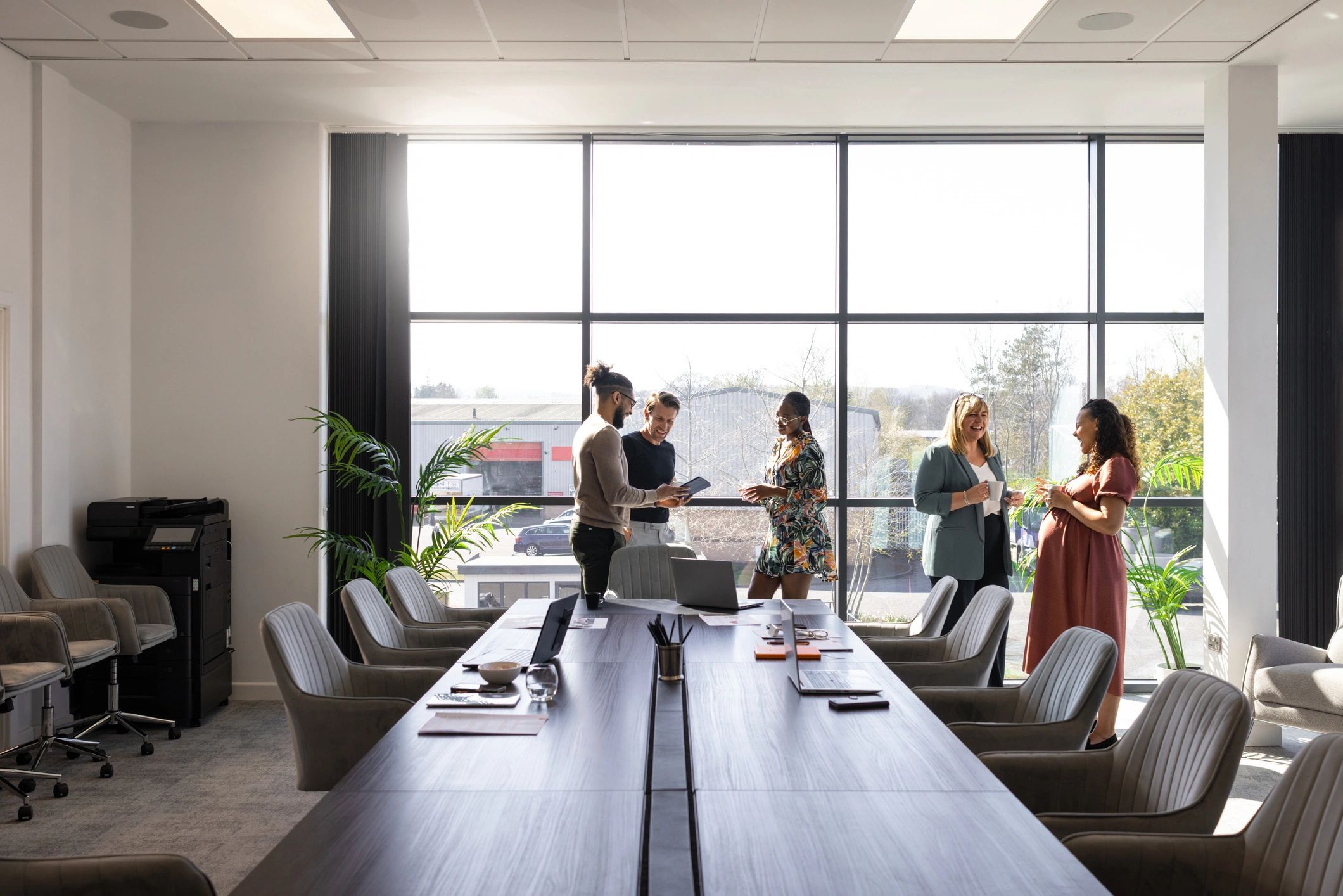 Business team discussing strategy in a modern conference room