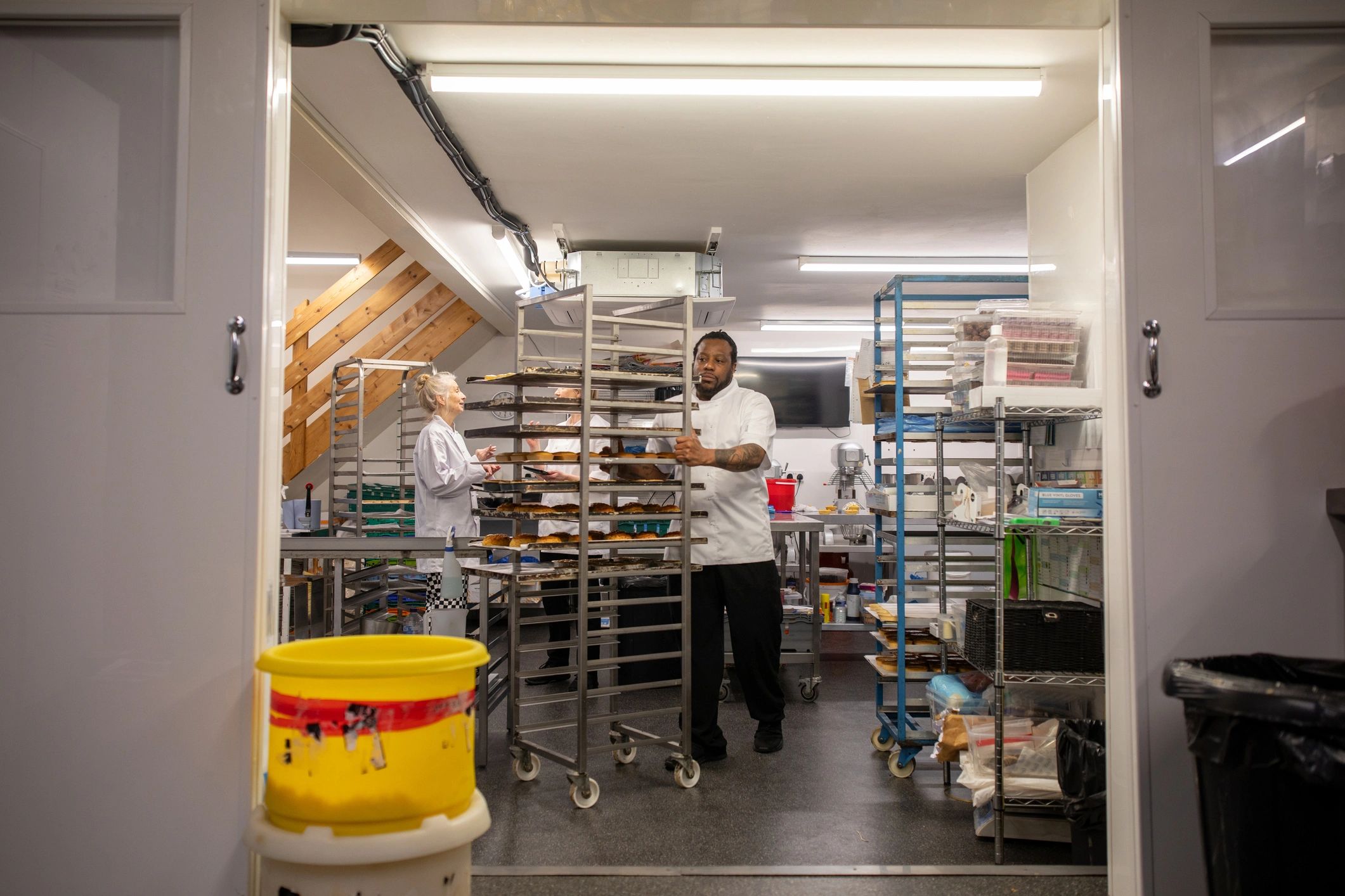 Restaurant team using digital tools in a kitchen